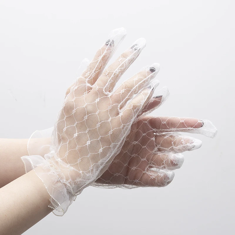 1 paire de gants noirs en dentelle pour femmes, Sexy, à la mode, en maille transparente, en Tulle, robe de mariée, de fête, de mariage, de conduite, gants courts