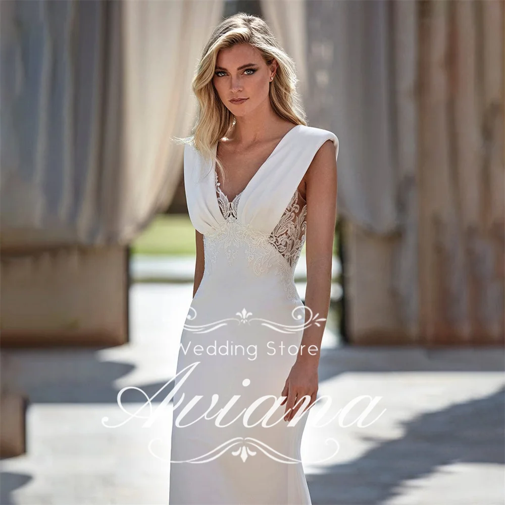 Aviana مخصص الخامس الرقبة عارية الذراعين حورية البحر فستان الزفاف الدانتيل والتطريز يزين بلا أكمام زر سويب تراين موردن بسيط