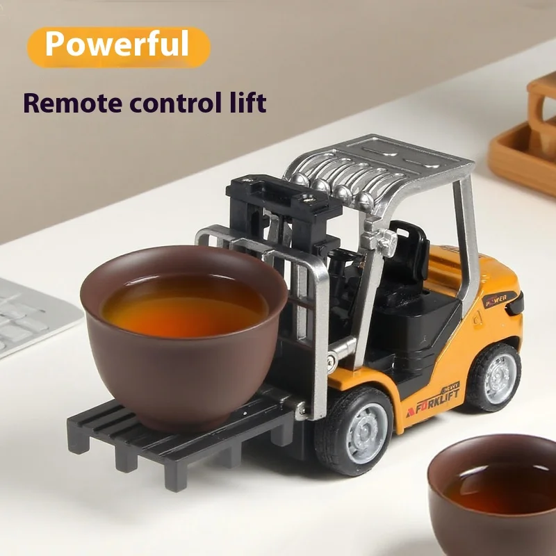 

Hot Selling 1: 64 Mini Alloy Remote Control Forklift Desktop Model With Adjustable Construction Vehicle Toy 2.4g Remote Gift