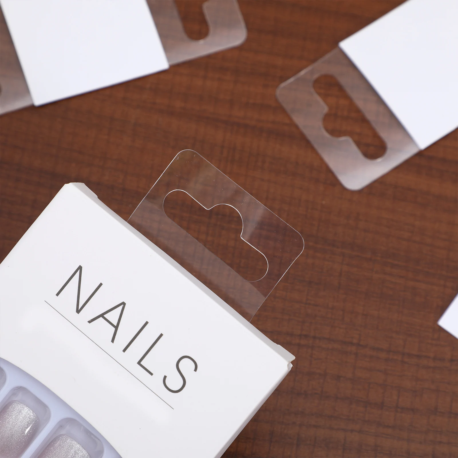 

100pcs Hanging Tags Clear Adhesive Retail Packaging Display Hangers Slot Hole Pegboard Transparent Product Signage Notebook