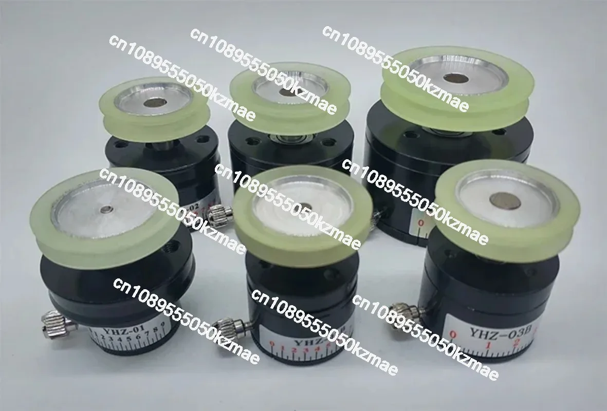 Winder tensioner, magnetic damper, torque controller
