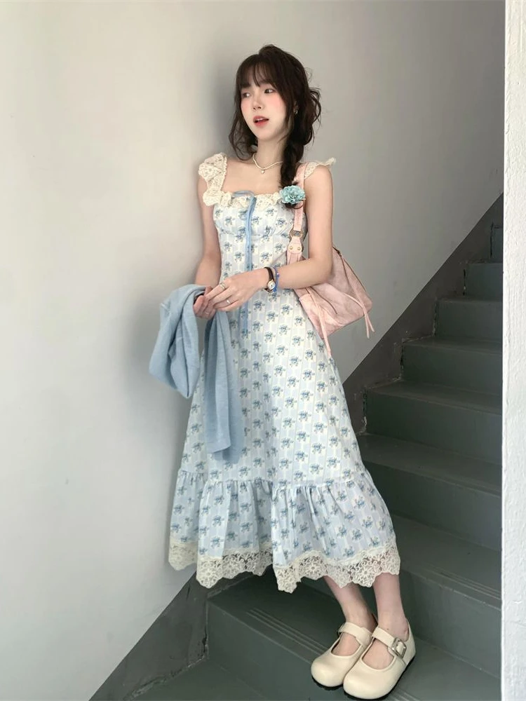Damska sukienka w stylu francuskim z falbanką i kokardką Słodka sukienka wróżki Letni kwiatowy nadruk Spaghetti Pasek Bez rękawów Szykowne sukienki z wysoką talią