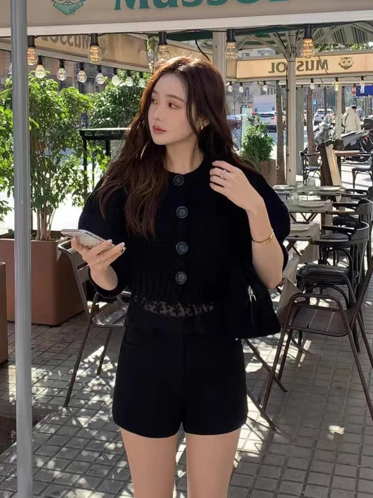 ソフトショートバブルスリーブニットセーター女性の春夏の新スタイルシングルボタンエレガントなオープンカーディガントップ