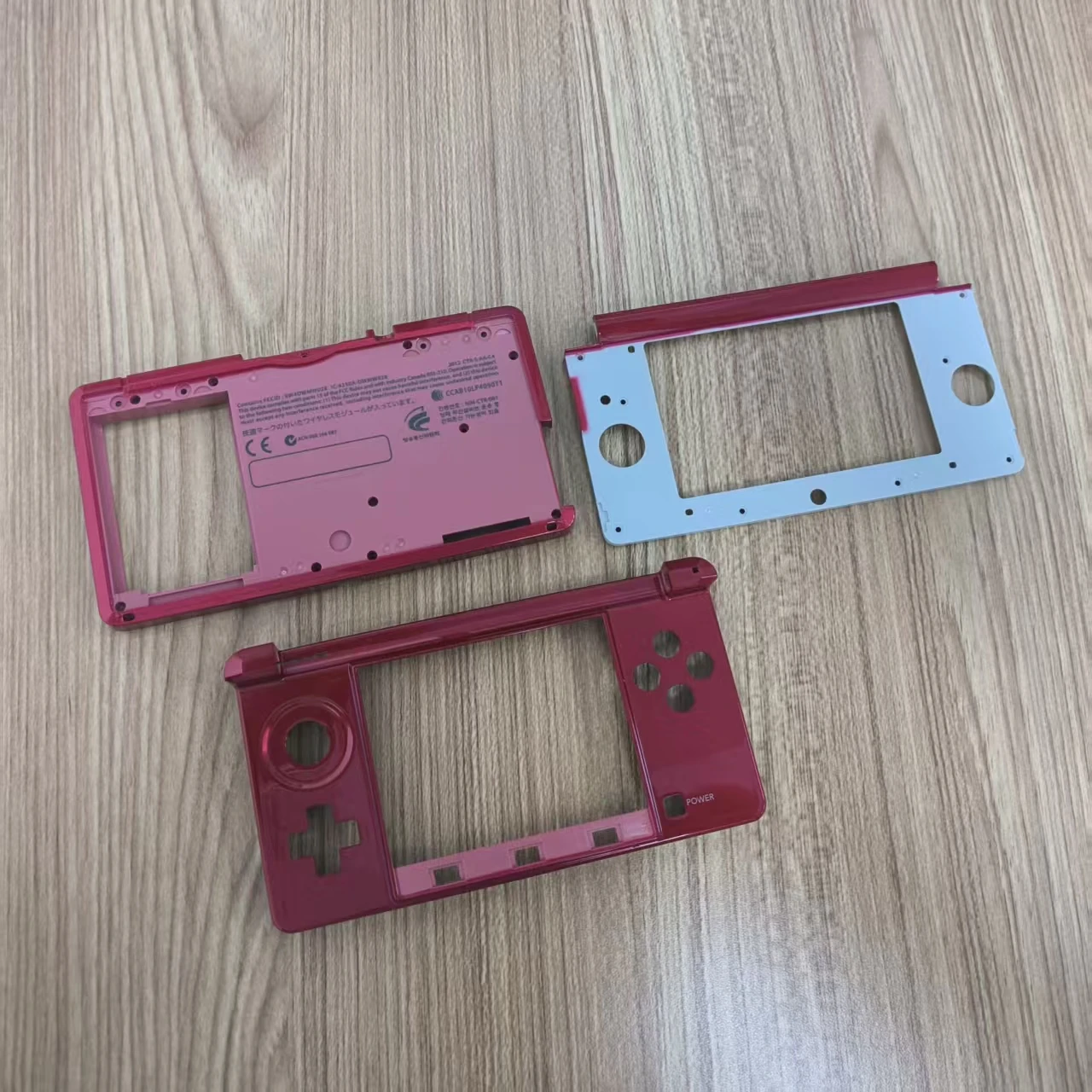 Scatola protettiva a conchiglia per copertura alloggiamento con cornice centrale colorata originale per console 3DS