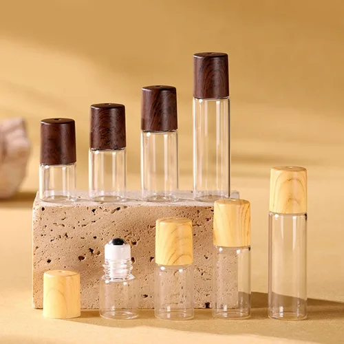 Imagen 2 del producto 20X 50X botellas enrollables de aceite esencial de vidrio 1/2/3/5ml viales de rodillo ámbar/transparente tapas de plástico (aspecto de madera) tapas Perfume Mini nuevo