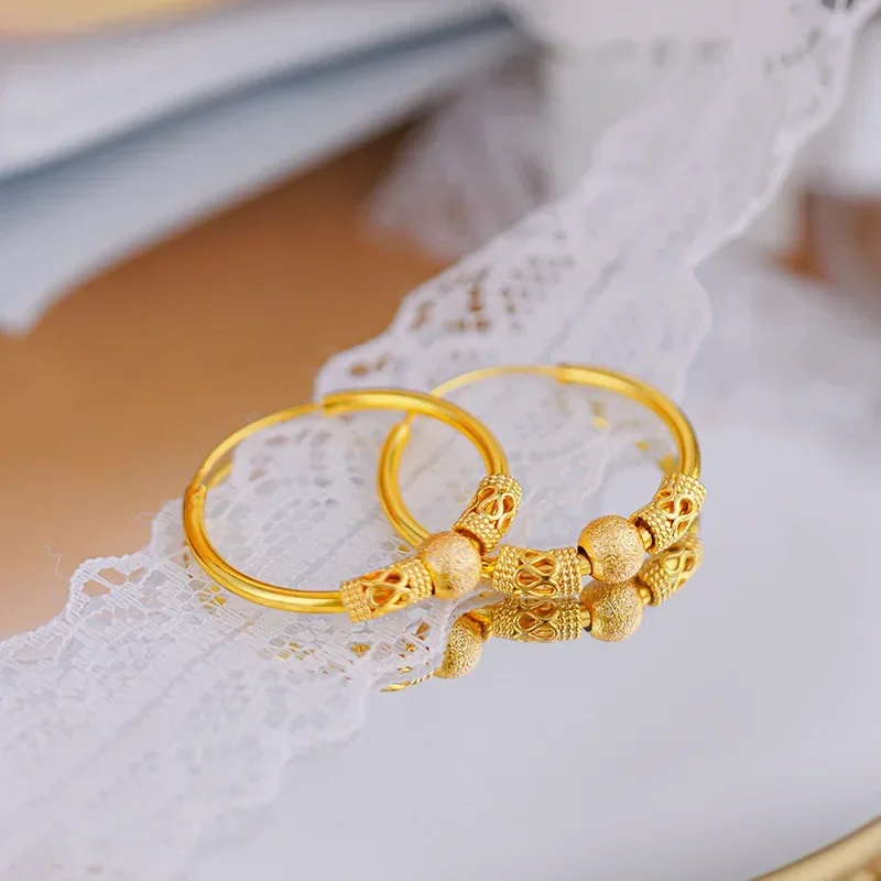 

9999 Real Gold 24K Design Sense Retro Transfer Bead Earrings Golden Girl Hollow Clip Bead Temperament Versatile Earrings