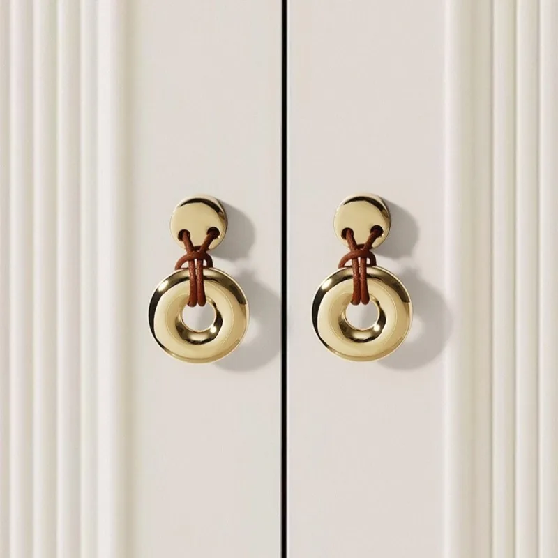Golden wardrobe door solid single hole leather handle drawer cabinet small handle.