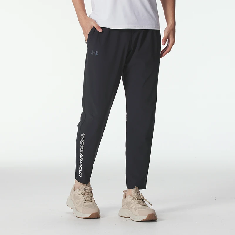 Pantalones para hombre Under Armour con tejido repelente al agua, tejido elástico, pantalones deportivos cómodos para correr, informales 1365622-002