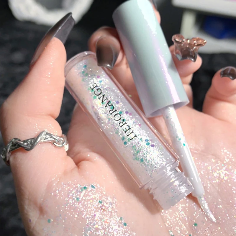 - HERORANGE Glitzer-Highlighter Flüssiger Lidschatten Eyeliner Langanhaltend Wasserfest Schimmernd und Glänzend Augen-Schmetterlingsstift Schönheitswerkzeug