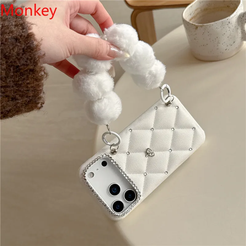 

Роскошные чехлы из искусственной кожи с 3D-текстурой «Планетарная кристаллическая решетка» и браслетом-цепочкой с меховым помпоном для iPhone 17, 16, 15, 14 Plus, 13 Pro Max, Air