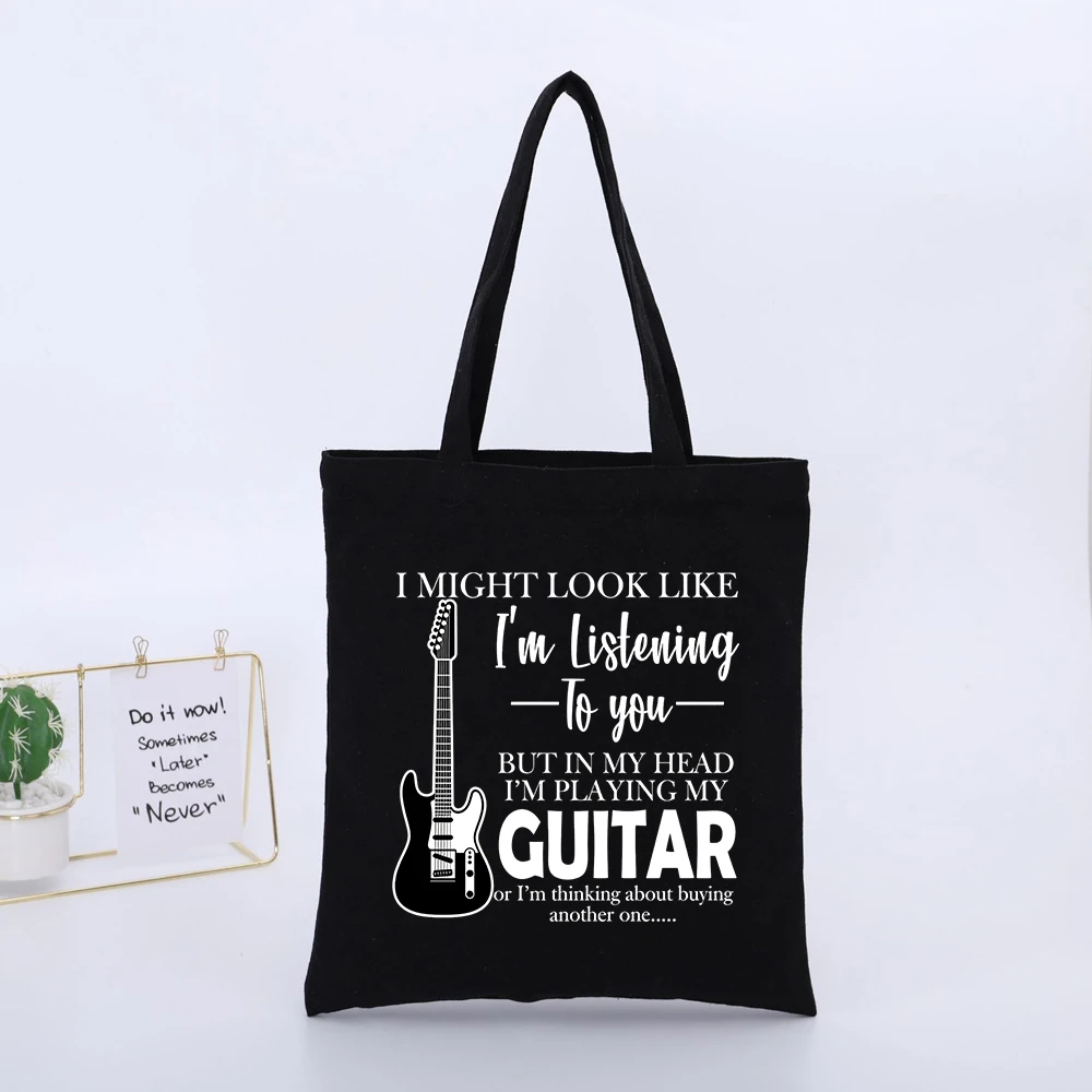 Guitar Enthusiast's Black Canvas Tote Bag with Typography Print, Casual Style for Daily Outings and Music Lovers
