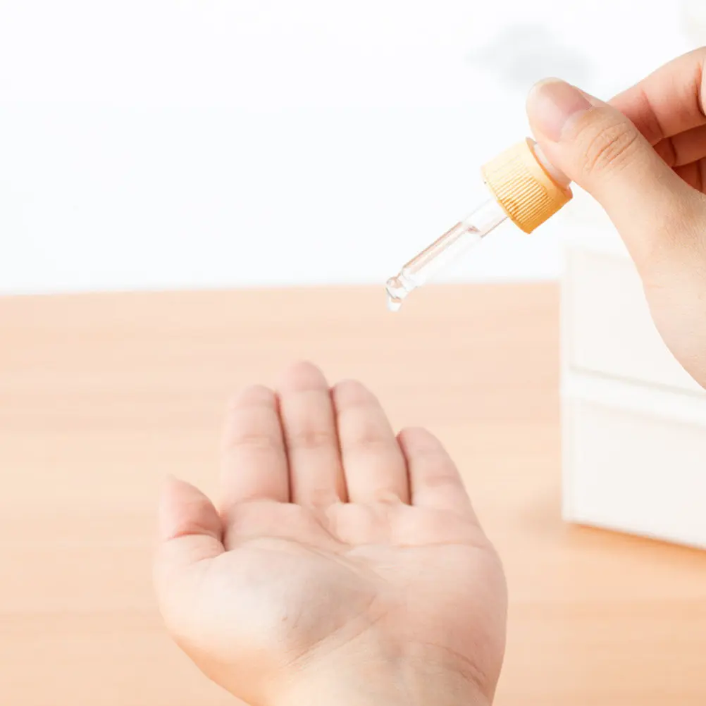 conjunto-de-4-frascos-de-vidro-com-conta-gotas-padrao-de-grao-de-madeira-cabeca-de-silicone-recipiente-para-Oleo-essencial-frasco-dispensador-de-vidro-de-15ml