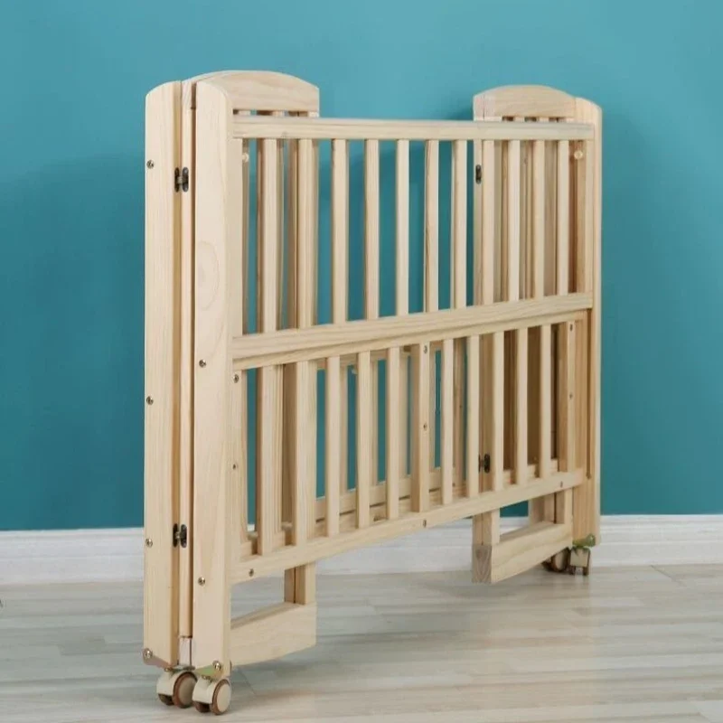 .Folding Crib Solid Wood Environmentally Friendly Paint-free Foldable Multifunctional Baby Crib.