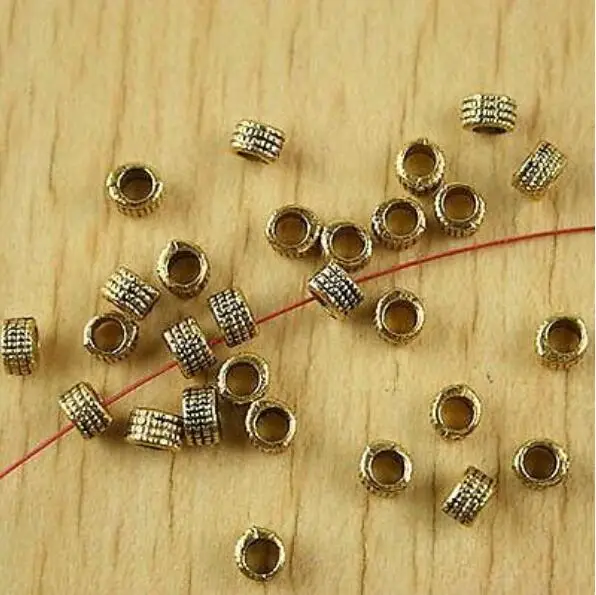 100pcs 4.3x3.1mm hole is 2.7mm columniform spacer beads h2335