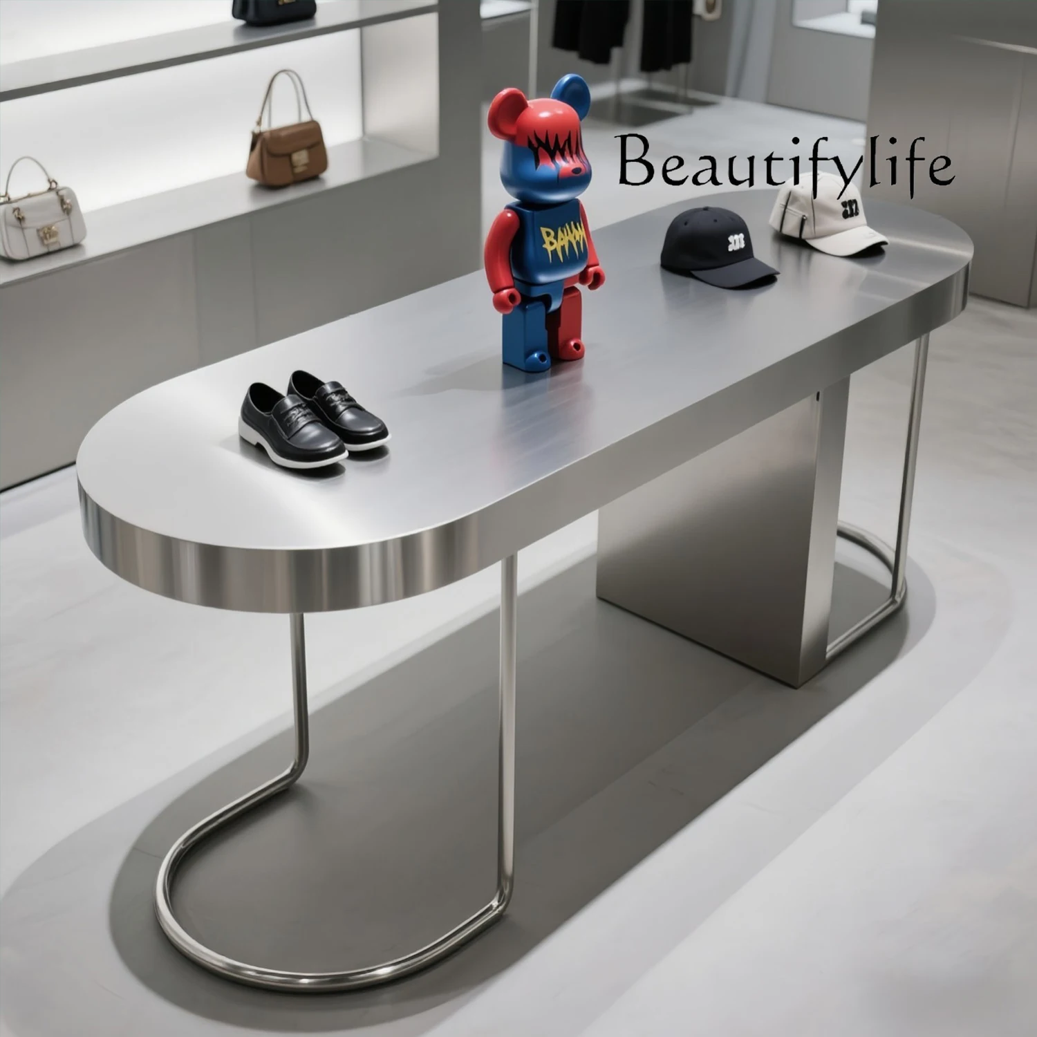 

Clothing store Nakajima table, running water table, shoe bag jewelry display table, stainless steel creative product display tab