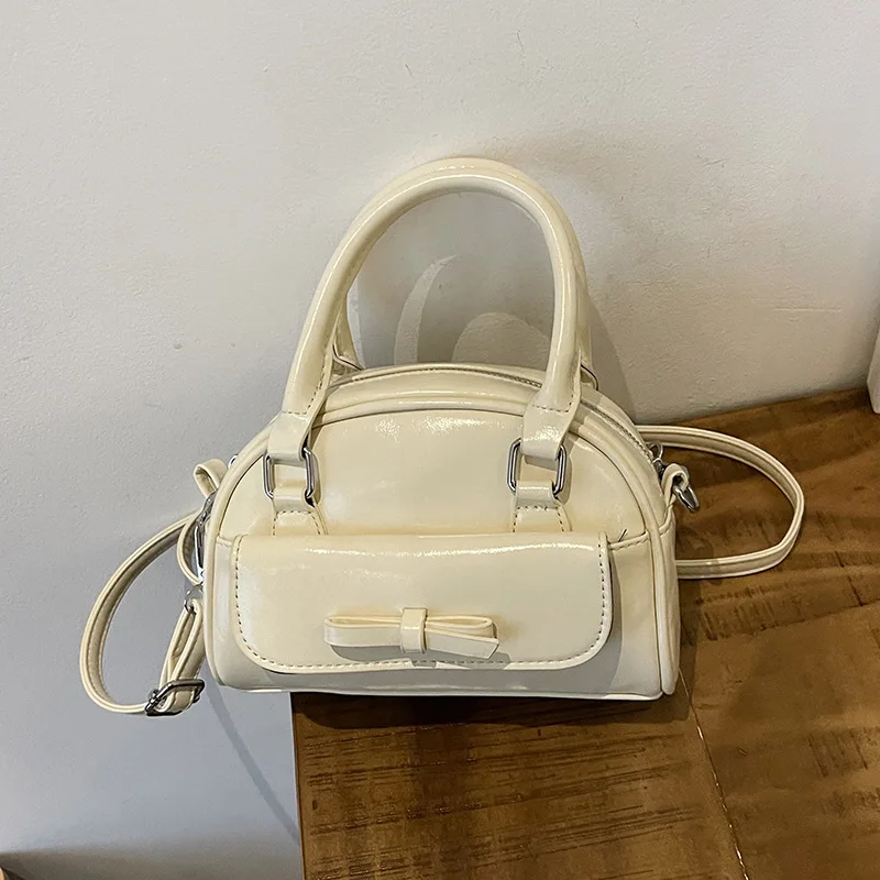 

Новые роскошные женские сумки 2025 года — нишевый дизайн с бантом, свежий и милый стиль, универсальная ручная сумка через плечо для отдыха