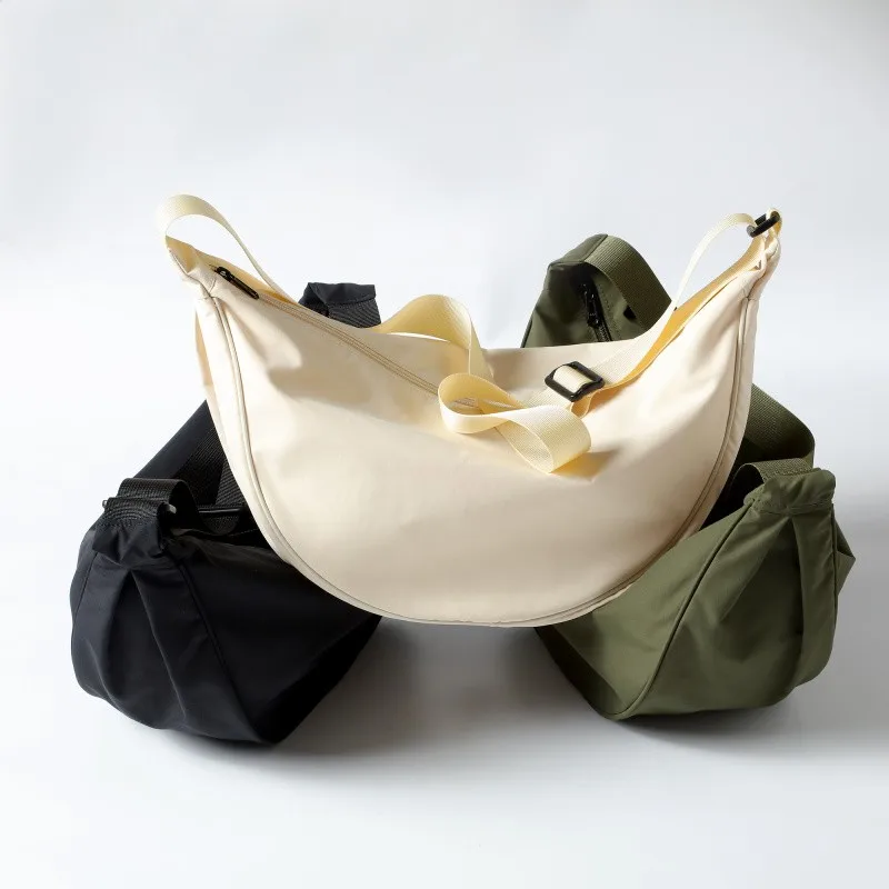 

High Densi Waterproof Lightweight Large Capaci Couples oulder Crossbody Dumpling Bag Women's Sle Men's Sle