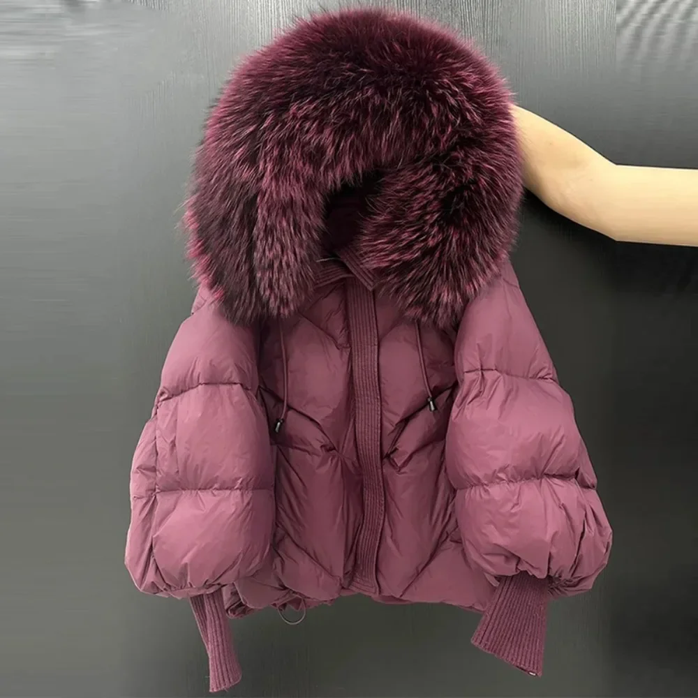 Cappotto di pelliccia di realtà Nuovo inverno Grande piumino con cappuccio in vera pelliccia da donna Addensare manica calda lavorata a maglia Piumino d'anatra bianco Parka medio lungo