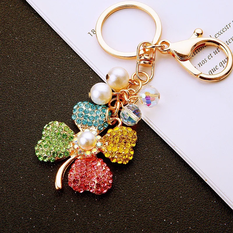 New Creative Diamond-encrusted Pearl Four-leaf Clover Car Keychain Metal Women's Bag Pendant Crystal String Key Chain Ring