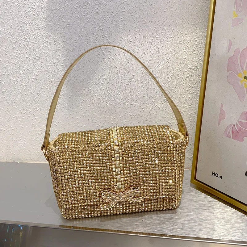 

Инкрустированный бриллиантами, цветной ромбовидный бант, маленькая квадратная сумка, обеденная сумка знаменитостей, портативная сумка через плечо под мышками.
