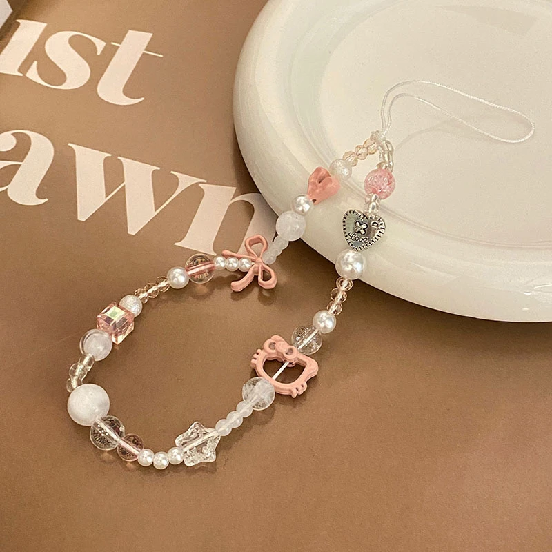 

Cute Pink Bow Hollow Hello Kitty Phone Chain Sanrio Phone Rope Knot Lanyard Wristlet Keychain Earphone Case Bag Pendant