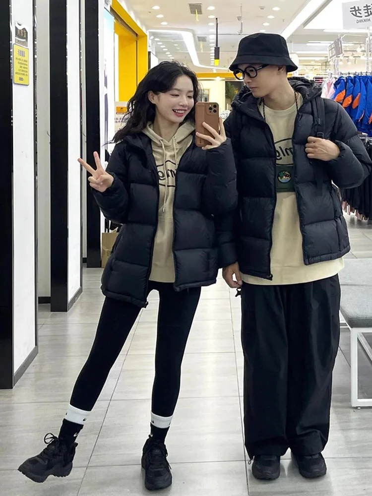 Chaqueta de plumón de color liso para mujer, estilo corto, invierno 2021, nueva chaqueta con capucha para hombre y mujer, chaqueta gruesa de plumón de pato blanco para parejas