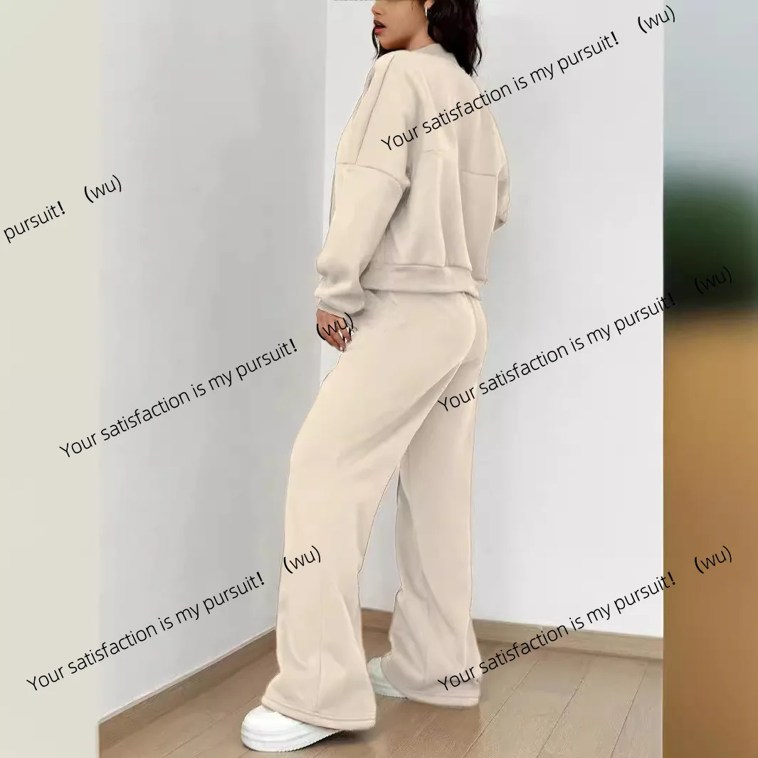 Setelan dua potong sweater fleece musim gugur dan musim dingin wanita tren mode kasual Eropa dan Amerika dengan kardigan ber-resleting dan celana panjang.