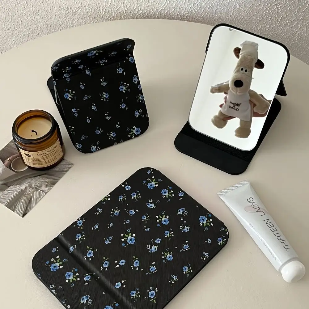 Pu lederen desktopstandaardspiegel Compacte cosmetische spiegel Bloemvouw make-upspiegel Opvouwbare lichtgewicht make-upspiegel Unisex