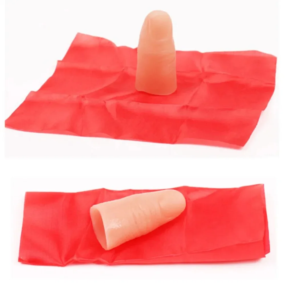 Magische Requisiten, verschwindender Seidenschal, Fingerspitze, rote Seide, Bühnenaufführungs-Requisiten, Gummi-Streich-Spielzeug, Party, Nahaufnahme, Magie