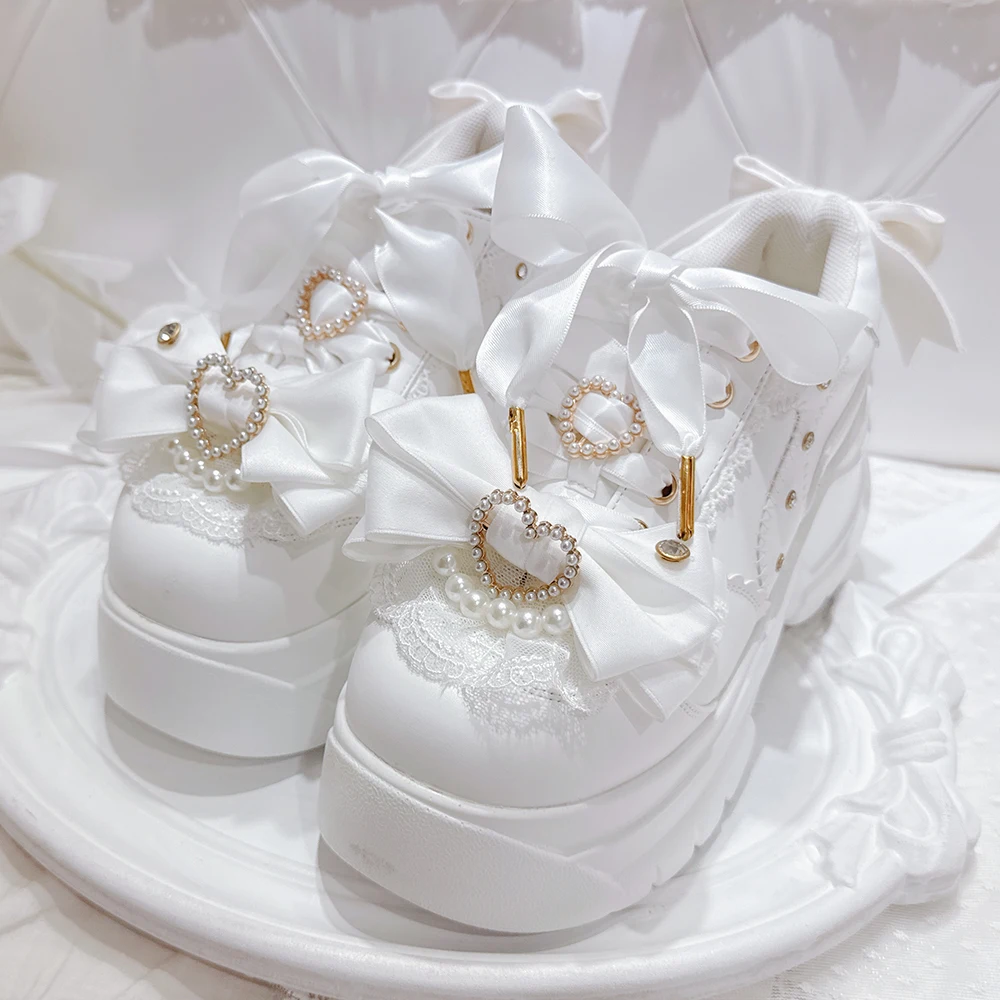 Scarpe con plateau Lolita rosa prodotte in serie originali Mine Primavera e autunno Décolleté con tacco alto impermeabili con fiocco dolce da ragazza