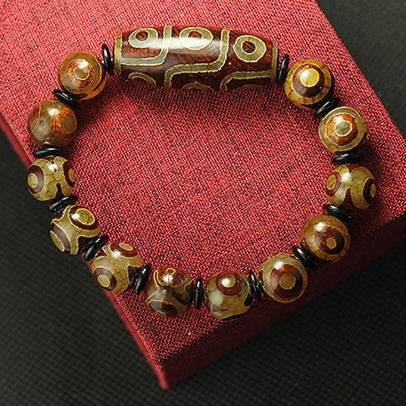 

Nine-Eyed Dzi Bead Bracelet Jewelry