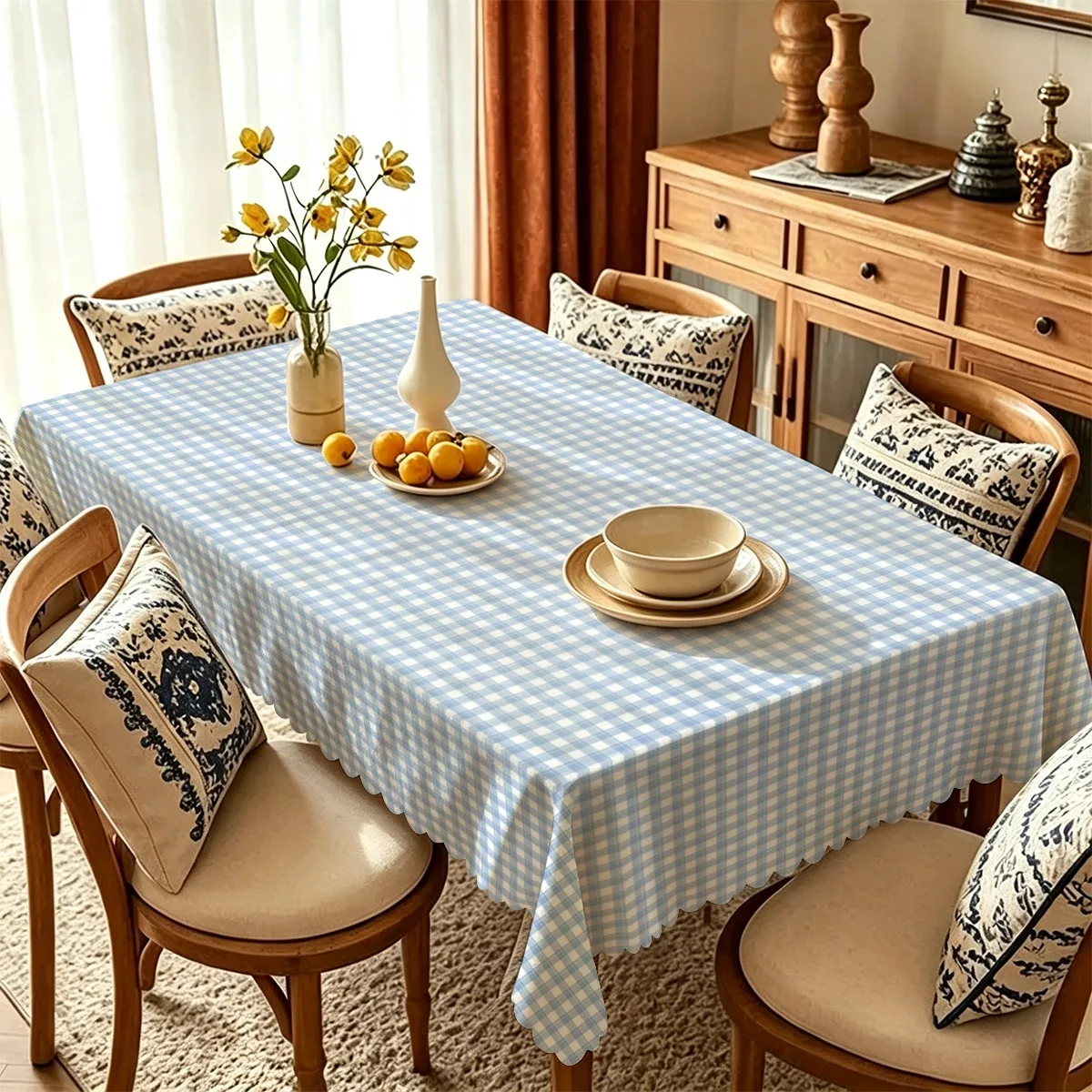 A tablecloth featuring a fine blue and white check pattern combined with overall white ruffled edges as the design.
