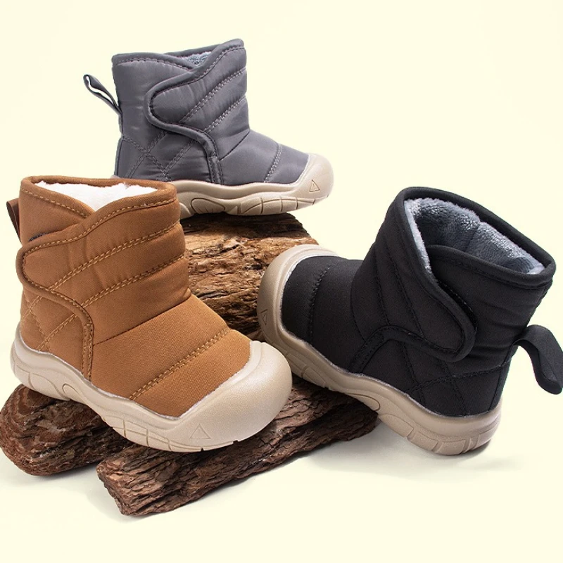 

Зимние детские ботинки2025Новые детские короткие сапоги на толстой подошве, детские противоскользящие мужские и женские повседневные универсальные зимние ботинки, модные ботинки для девочек
