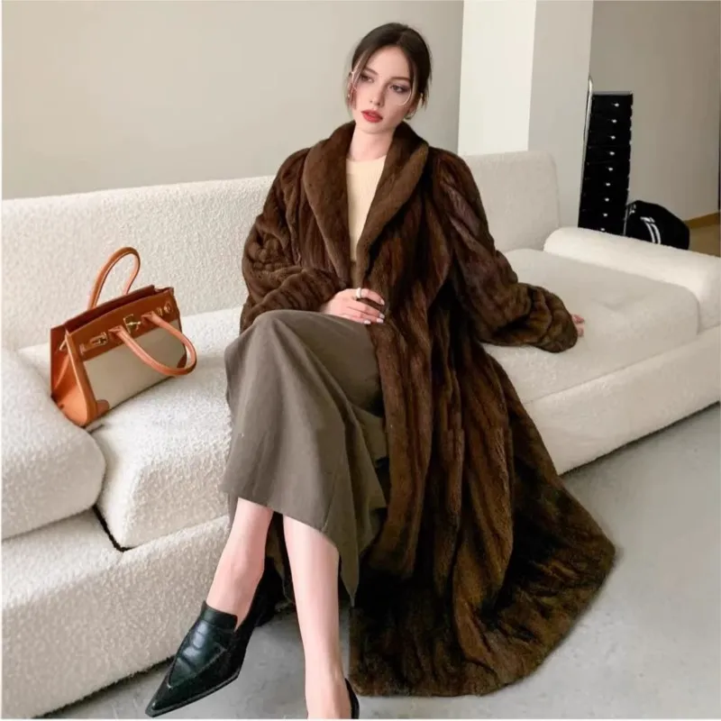 The new hybrid fur coat a long is warm yet classic and luxurious with integrated in one