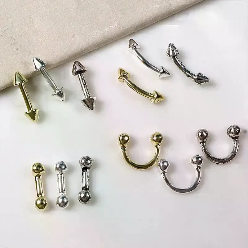 20 pezzi di ciondoli per unghie design stile punk parti per unghie borchie in lega oro argento curva freccia rivetto decorazione unghie accessori per arte