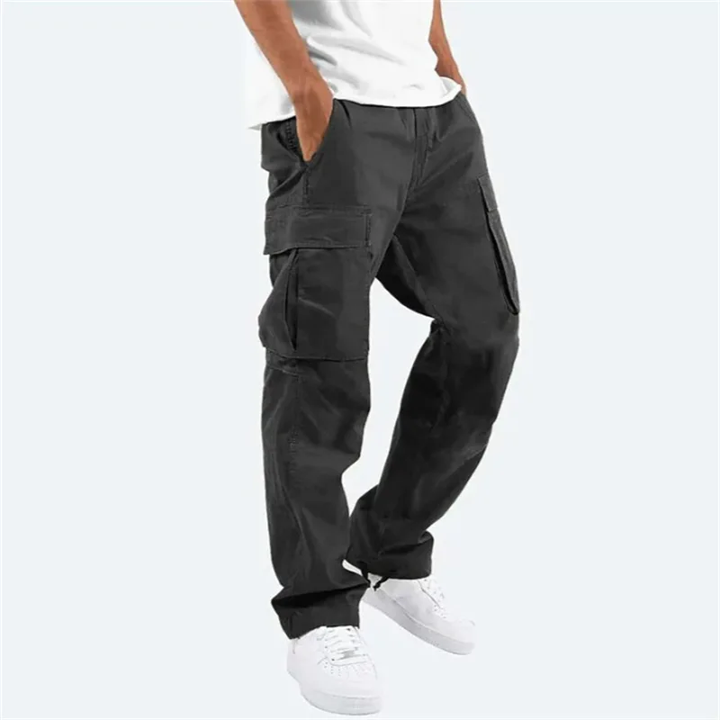 New trendy street-style men's long work pants with multiple pockets made of twill fabric and having a washed finish  cargo-hosen