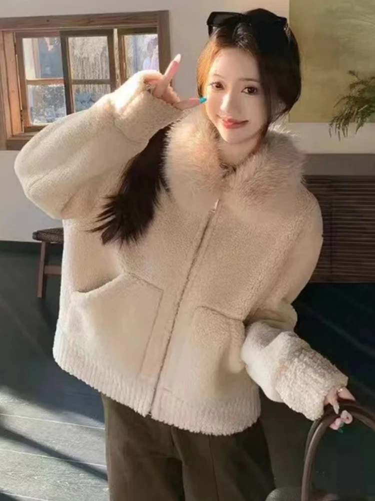 Elegancki długi płaszcz z futrzanym kołnierzem, damski, jesienno-zimowy, luźny krój, wyszczuplający top, koreański styl, skóra i futro.