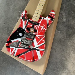 Left hand Edward Eddie Van Halen heavy cultural object red Franken electric guitar black and white stripes Freud rose Tremolo