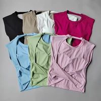 Yoga à manches courtes femmes coussin de poitrine fixe course Gym Sexy dos nu court entraînement sport T-shirt taille minceur Fitness gilet 1