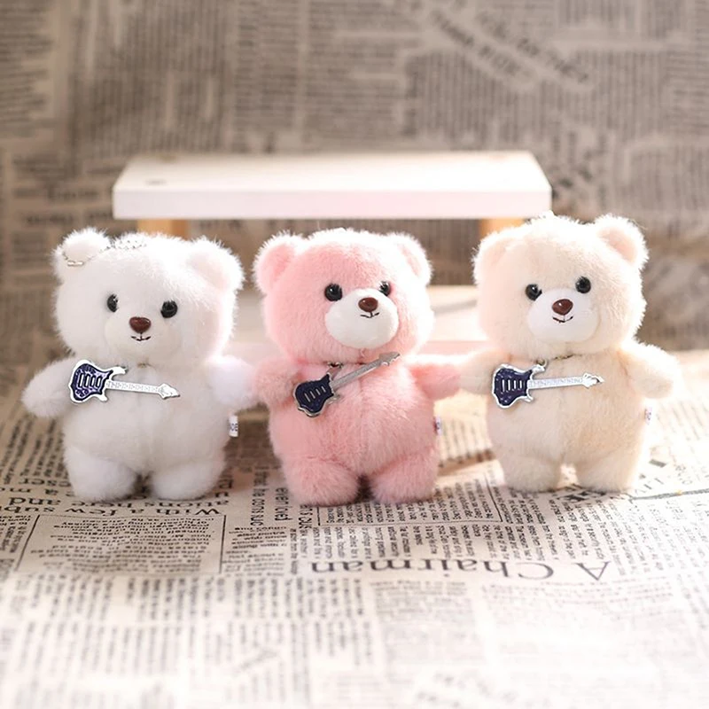 Poupée en peluche avec pendentif ours en peluche de guitare douce - Porte-clés en peluche mignon pour sac à dos - Cadeau d'anniversaire idéal pour enfant.
