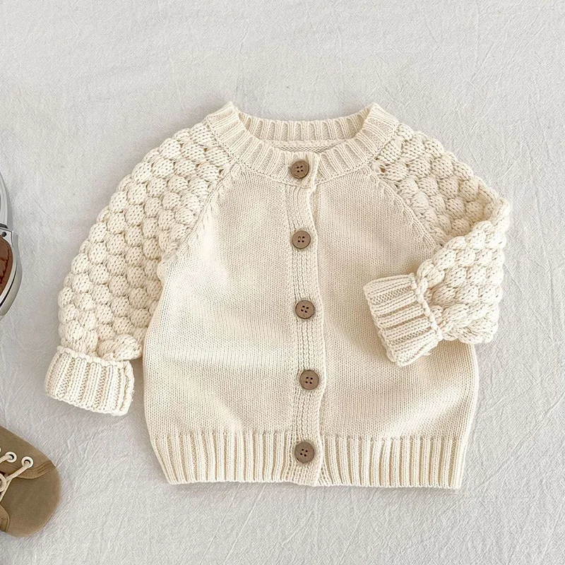 جديد ربيع 2026 سترة حياكة للأطفال الأولاد والبنات بأكمام طويلة بلون سادة على الطراز الكوري 0-3 سنوات معطف سترة للأطفال حديثي الولادة