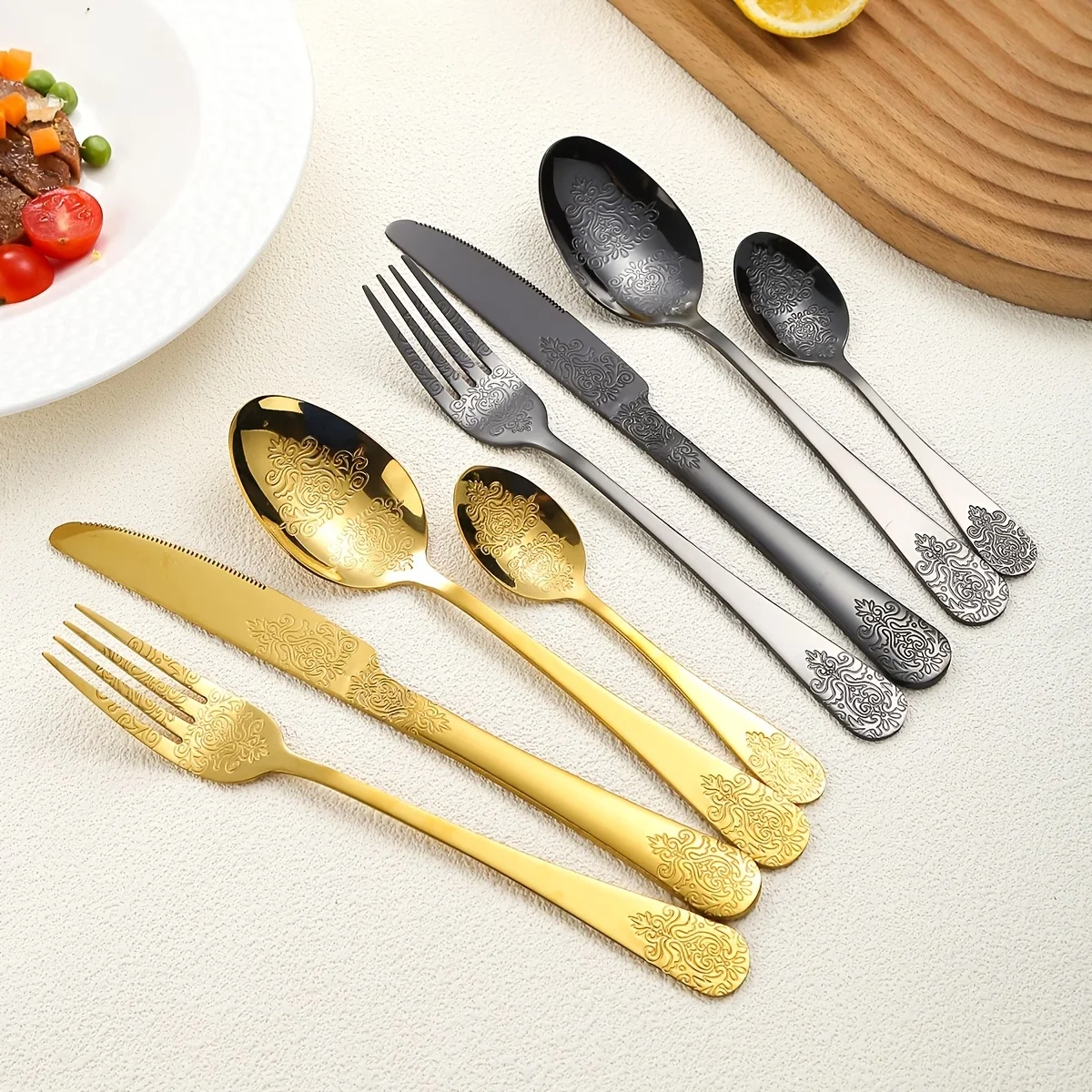 40-Piece Mirror-Finish Stainless Steel Cutlery Set Includes a Knife, Fork, Spoon, Coffee Spoon, and Dessert Fork Set. The Cutler