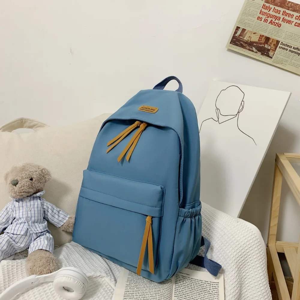 

High Quality Nylon Polyester Versatile Backpack White Grey Black Blue Washable Computer Bag Travel Bags Women Men