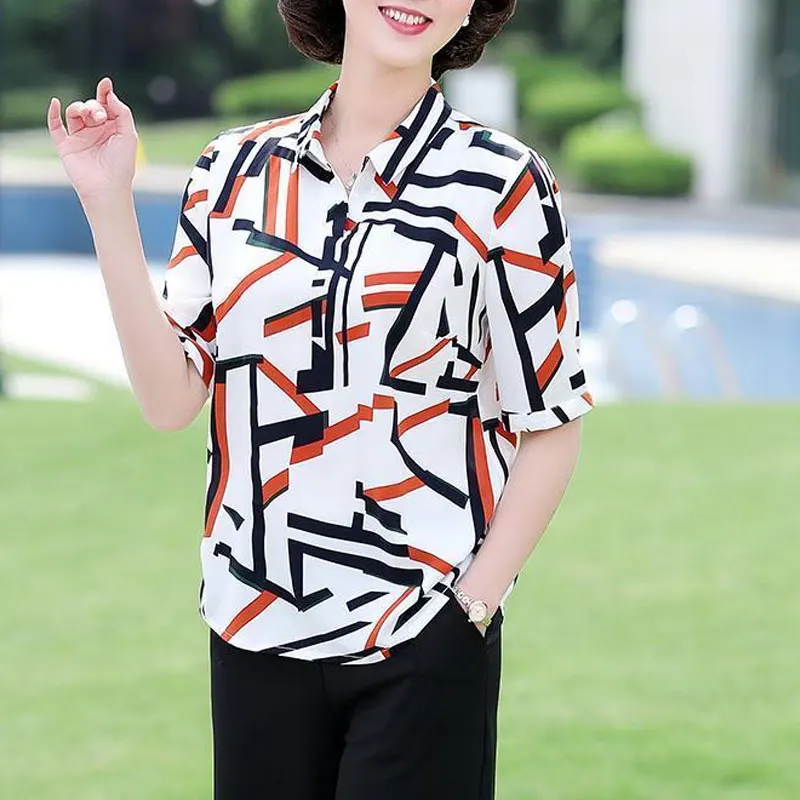 2023 Casual Turn-down Collar Moda Impresso Camisa de Verão Solto Manga Curta Roupas Femininas All-match Commute Emendado Blusa