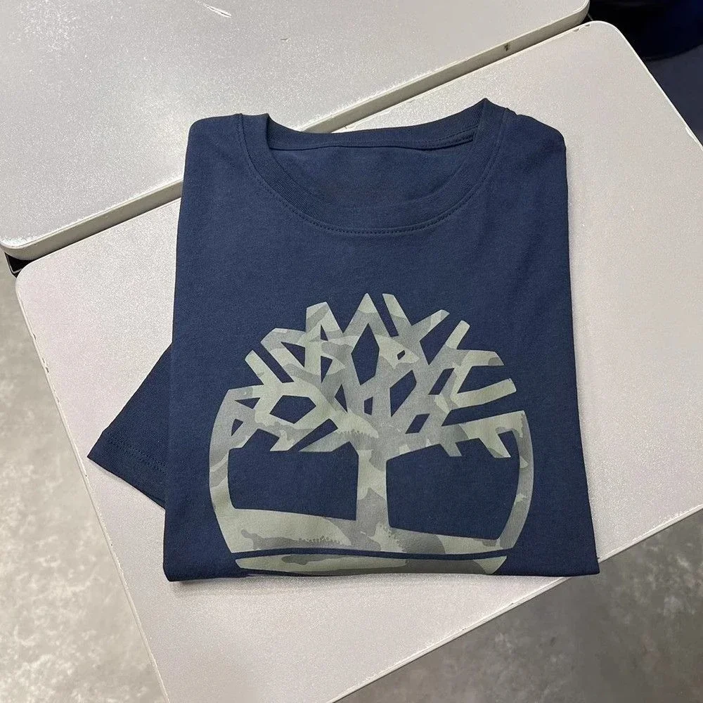 تي شيرت بأكمام قصيرة من القطن مطبوع على الموضة لعام 2025 ذو علامة تجارية راقية فضفاضة ومتعددة الاستخدامات