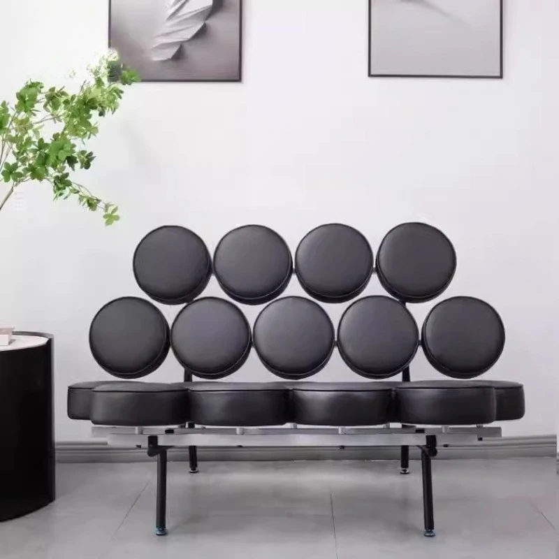 Simple designer creative leather backrest marshmallow sofa living room model room casual sofa chair