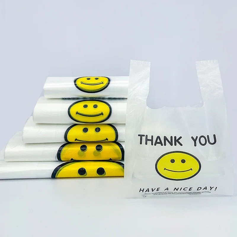 Transparent smiling face bag thickened takeout food bag commercial doggy bag convenient bag wholesale plastic bag vest bag