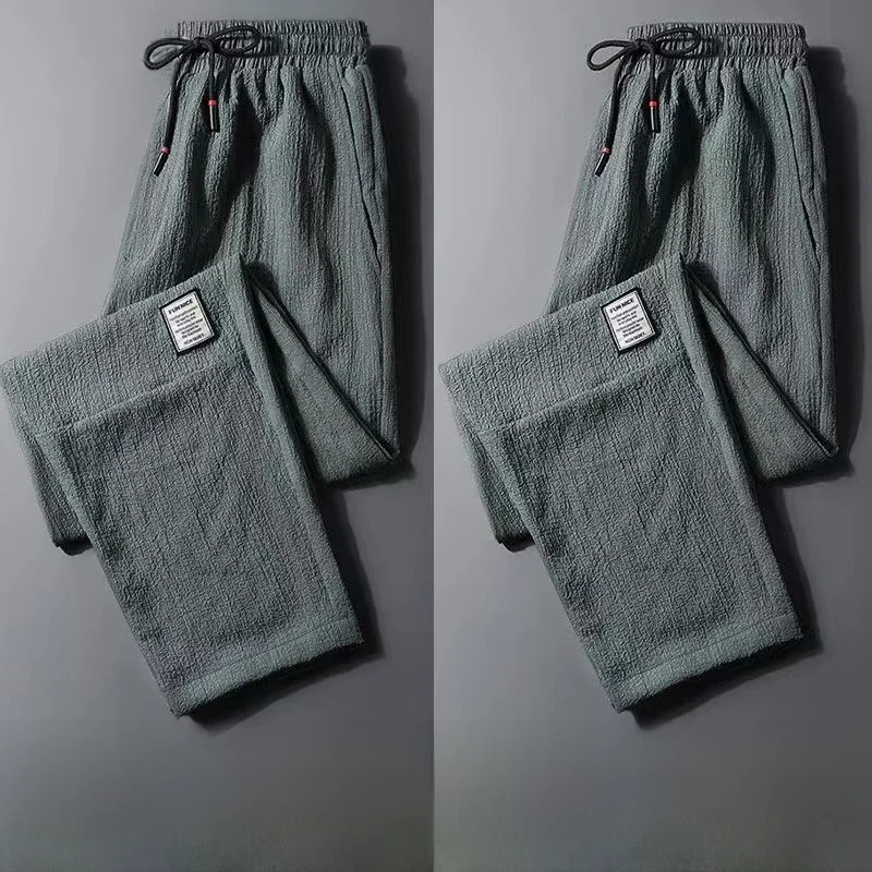 夏のコットンリネンワークパンツメンズ耐摩耗性ルーズオールマッチアウトドアカジュアルパンツ快適なルーズフィット作業服