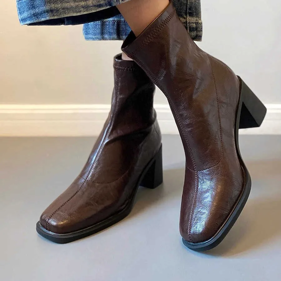 

Sheepskin version, genuine leather Korean version, high heel, silent square head, thin boots, short boots, thick heel, retro