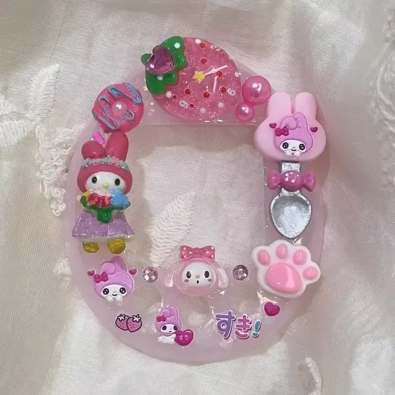 Custodia protettiva elettronica per animali domestici Sanrio Melody Laurel Decorazione per cani Tamagotchi Uni Back Sha Dow Series per regalo di